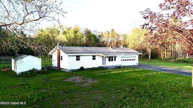 11 Mcdermott Rd, Mechanicville, NY 12118 - single story home featuring driveway, a front lawn, and a garage