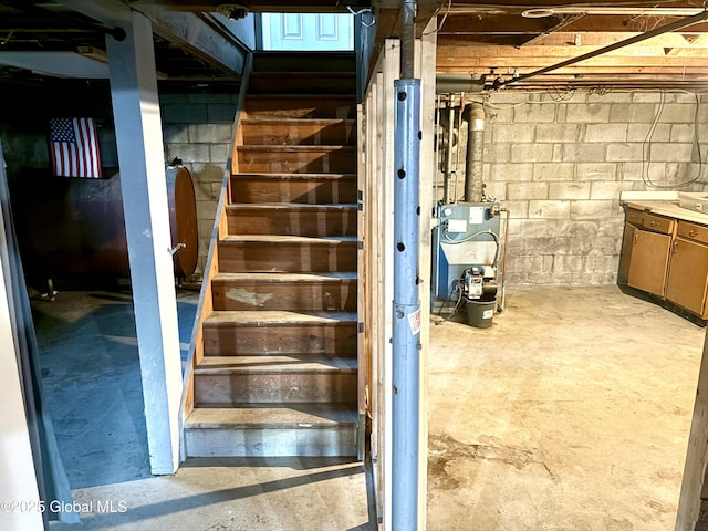 11 Mcdermott Rd, Mechanicville, NY 12118 - staircase featuring concrete flooring and a heating unit