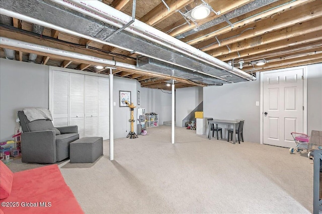 finished below grade area featuring carpet flooring