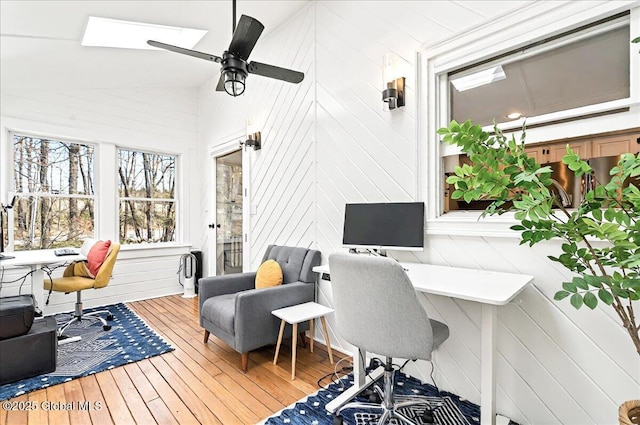 office space featuring wood-type flooring and ceiling fan