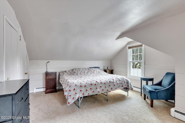 carpeted bedroom with a baseboard radiator, vaulted ceiling, and baseboard heating
