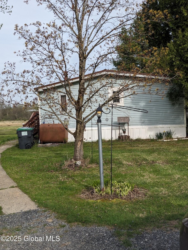 70 Dick Lynch Rd, Stillwater, NY 12170 - view of property exterior featuring a lawn