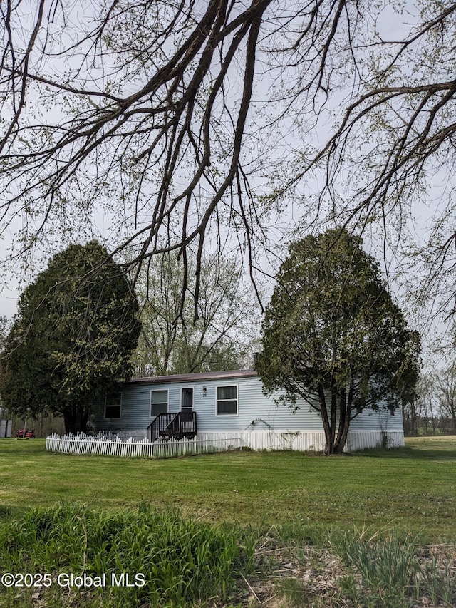 70 Dick Lynch Rd, Stillwater, NY 12170 - rear view of property featuring a lawn