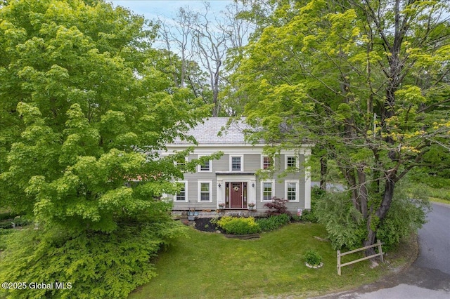291-294 Gilchrist Hill Rd, Hartford, NY 12838 - view of front of house with a front lawn