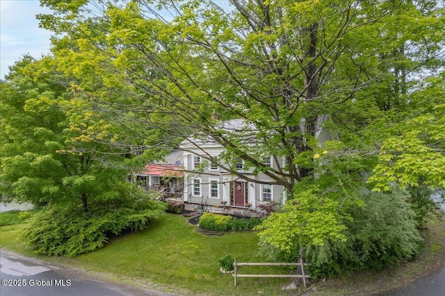 291-294 Gilchrist Hill Rd, Hartford, NY 12838 - obstructed view of property featuring a front lawn