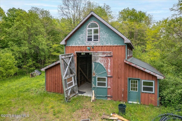 291-294 Gilchrist Hill Rd, Hartford, NY 12838 - view of outdoor structure with a forest view
