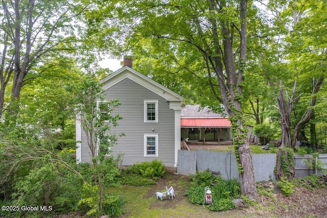 291-294 Gilchrist Hill Rd, Hartford, NY 12838 - view of home's exterior featuring a chimney