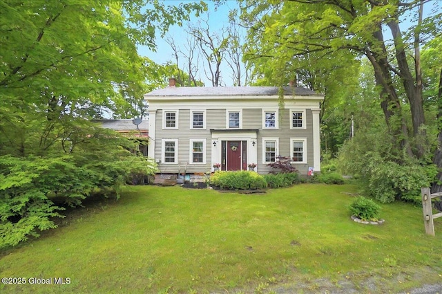 291-294 Gilchrist Hill Rd, Hartford, NY 12838 - view of front facade with a chimney and a front lawn