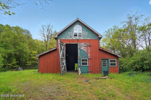 291-294 Gilchrist Hill Rd, Hartford, NY 12838 - rear view of house featuring an outdoor structure and a barn