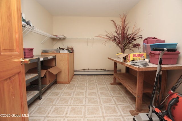 storage room featuring a baseboard radiator