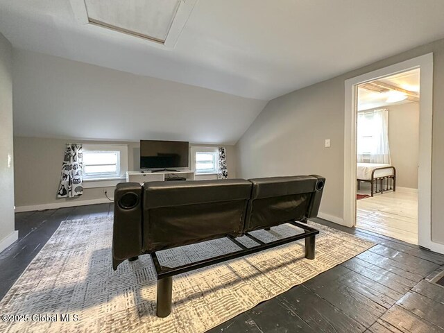 11 Mill St, Chester, NY 12817 - living room featuring baseboards, vaulted ceiling, and dark wood-type flooring