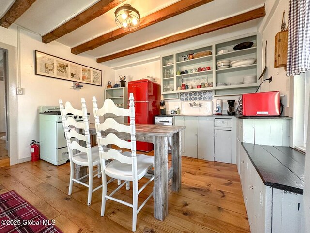 11 Mill St, Chester, NY 12817 - kitchen featuring light wood-style floors, dark countertops, and beamed ceiling