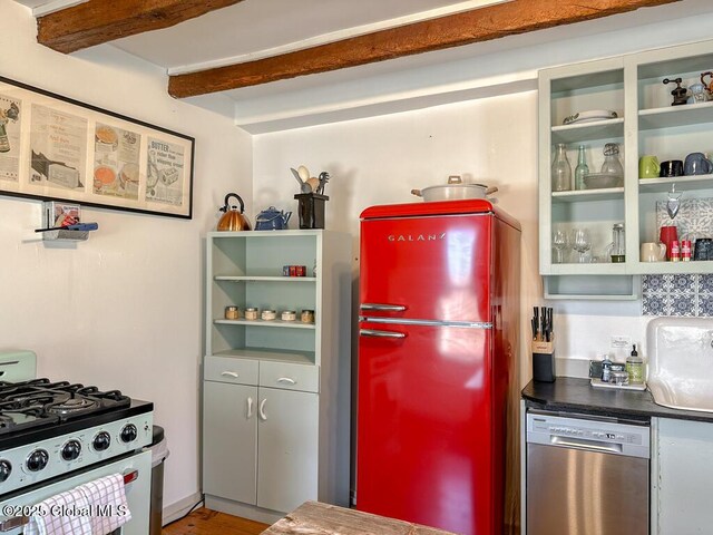 11 Mill St, Chester, NY 12817 - kitchen with open shelves, beam ceiling, dishwasher, gas stove, and freestanding refrigerator