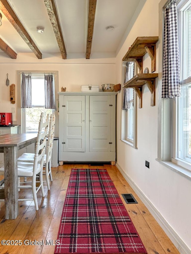 11 Mill St, Chester, NY 12817 - entryway with light wood-style floors, plenty of natural light, beamed ceiling, and visible vents