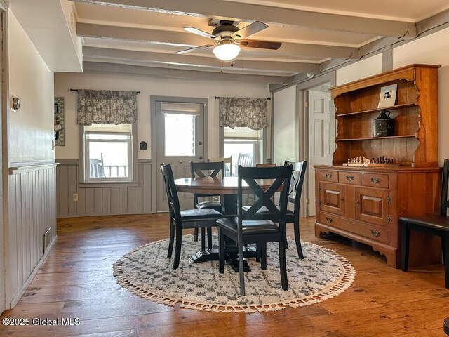 11 Mill St, Chester, NY 12817 - dining space featuring beamed ceiling, ceiling fan, wainscoting, and light wood-style flooring