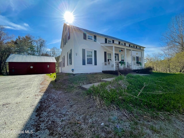 11 Mill St, Chester, NY 12817 - view of front of house featuring an outdoor structure and a porch