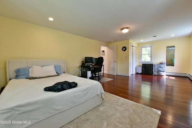 bedroom featuring recessed lighting, baseboards, and hardwood / wood-style floors