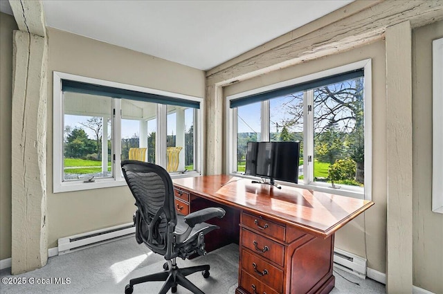 home office featuring baseboards and a baseboard heating unit