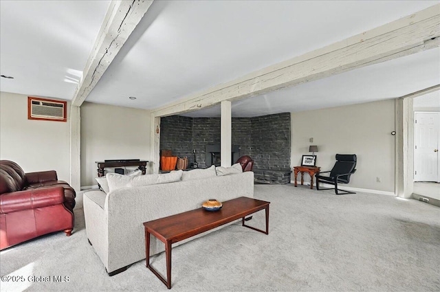 carpeted living room with baseboards, a wall mounted air conditioner, and beam ceiling