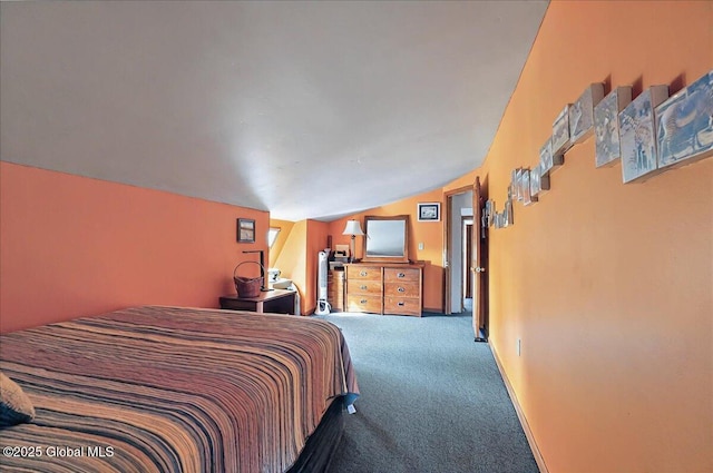 bedroom with carpet and lofted ceiling