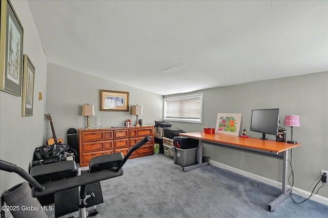 carpeted home office featuring baseboards