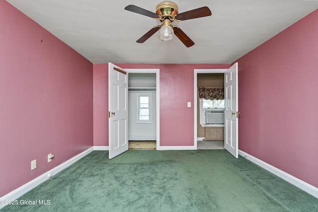 unfurnished bedroom featuring baseboards, carpet, ceiling fan, and cooling unit