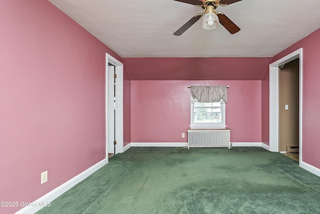 additional living space with carpet flooring, baseboard heating, baseboards, and radiator heating unit