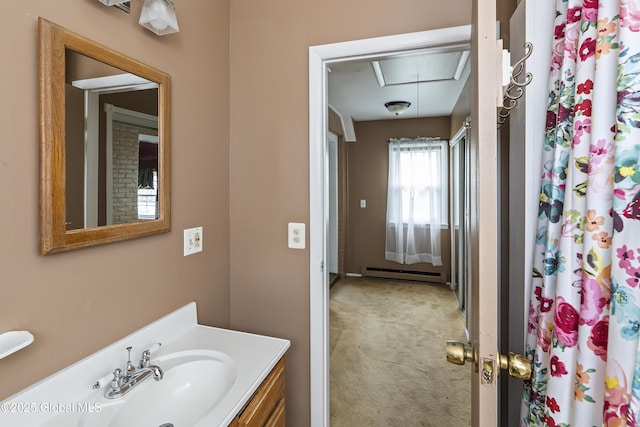 bathroom featuring vanity and a baseboard heating unit