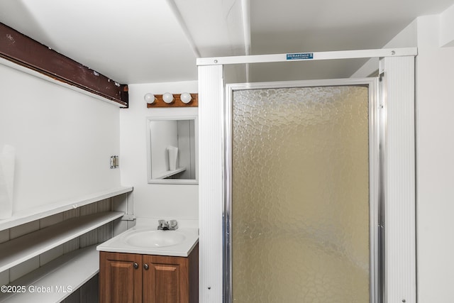 bathroom featuring vanity and a stall shower