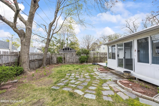 view of yard featuring a fenced backyard and a patio area