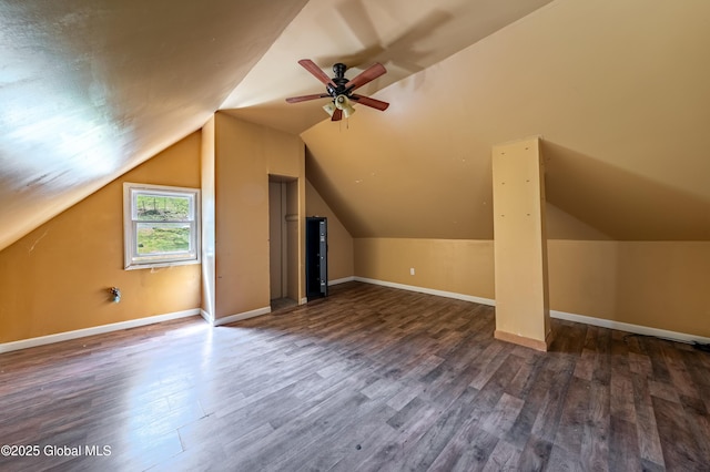 additional living space featuring ceiling fan, wood finished floors, and lofted ceiling
