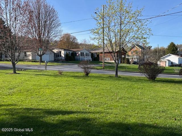 view of yard featuring a residential view