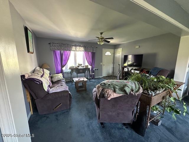 living room with carpet flooring and a ceiling fan