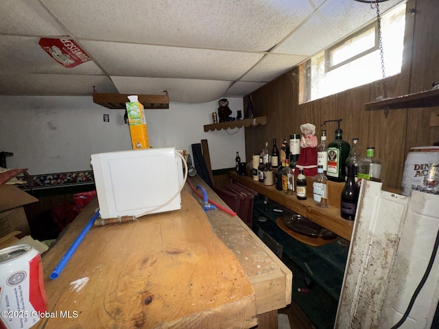 interior space featuring washer / dryer and a paneled ceiling