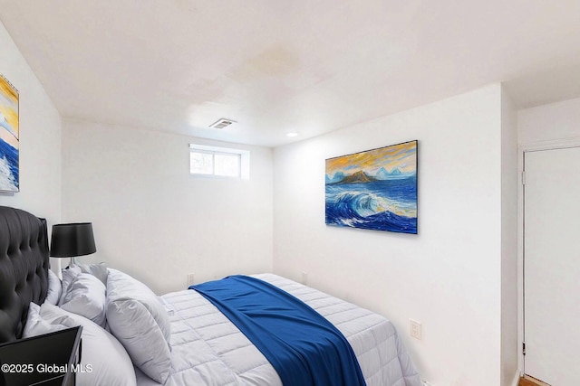 bedroom with visible vents