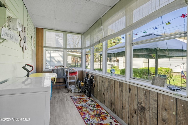 sunroom / solarium featuring plenty of natural light
