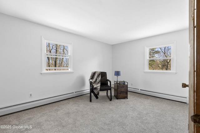 living area featuring carpet floors and a baseboard radiator