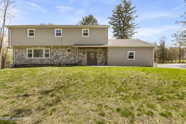27 Aaron Dr, Catskill, NY 12414 - colonial house featuring stone siding and a front lawn