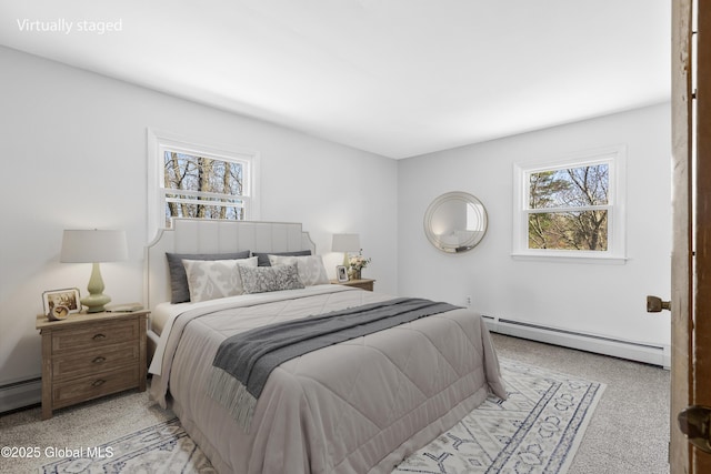 27 Aaron Dr, Catskill, NY 12414 - carpeted bedroom with a baseboard radiator