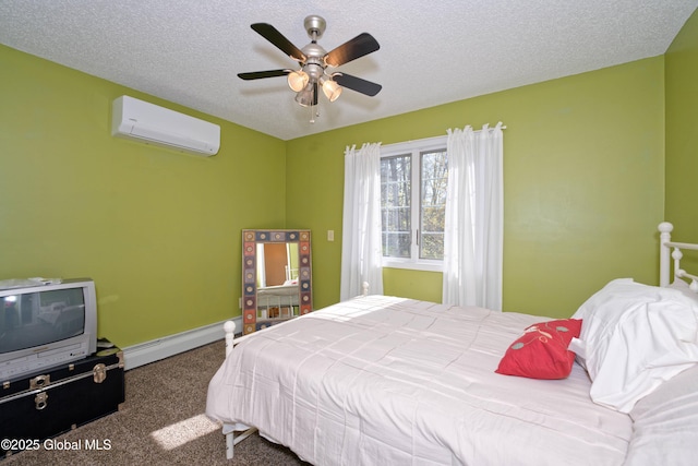 carpeted bedroom with a textured ceiling, a baseboard radiator, an AC wall unit, and ceiling fan