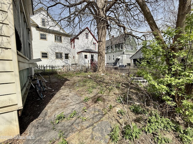 25-27 Caroline St, Amsterdam, NY 12010 - view of yard featuring fence