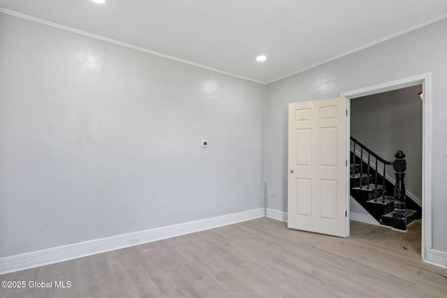 502 1st St, Albany, NY 12206 - spare room with wood finished floors, crown molding, stairs, recessed lighting, and baseboards