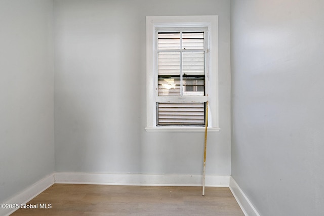 502 1st St, Albany, NY 12206 - empty room featuring baseboards and wood finished floors