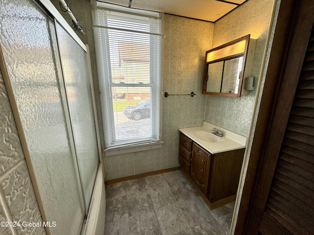 29 Park St, Fonda, NY 12068 - bathroom with vanity, baseboards, and a shower with shower door