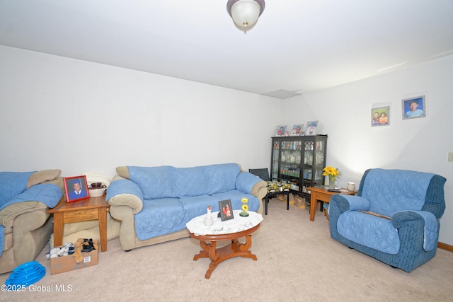living area with carpet