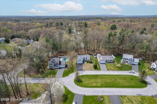 aerial view with a residential view and a forest view