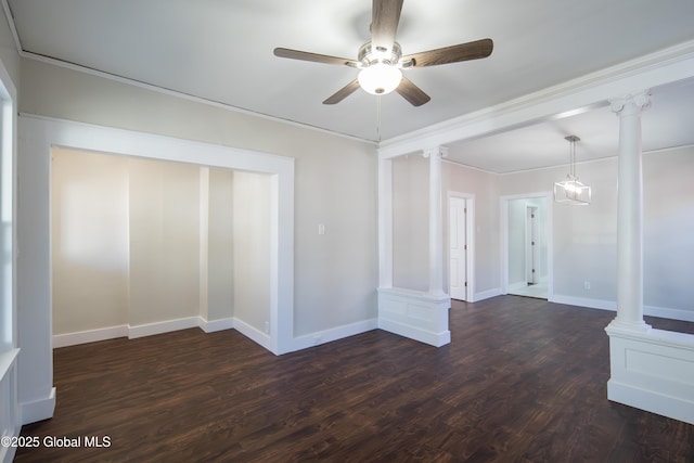 unfurnished room with baseboards, a ceiling fan, decorative columns, and wood finished floors