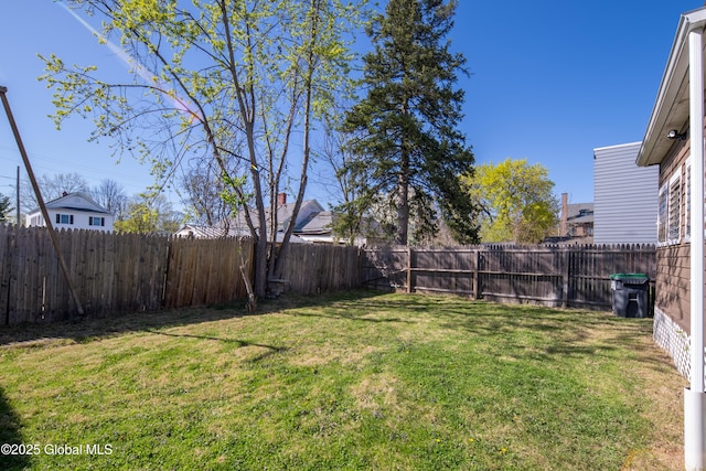 view of yard featuring a fenced backyard