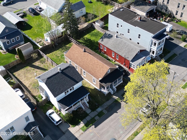 birds eye view of property with a residential view