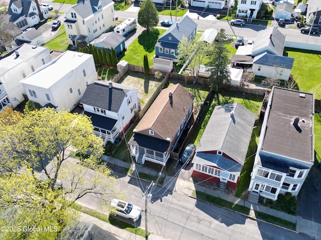 birds eye view of property with a residential view